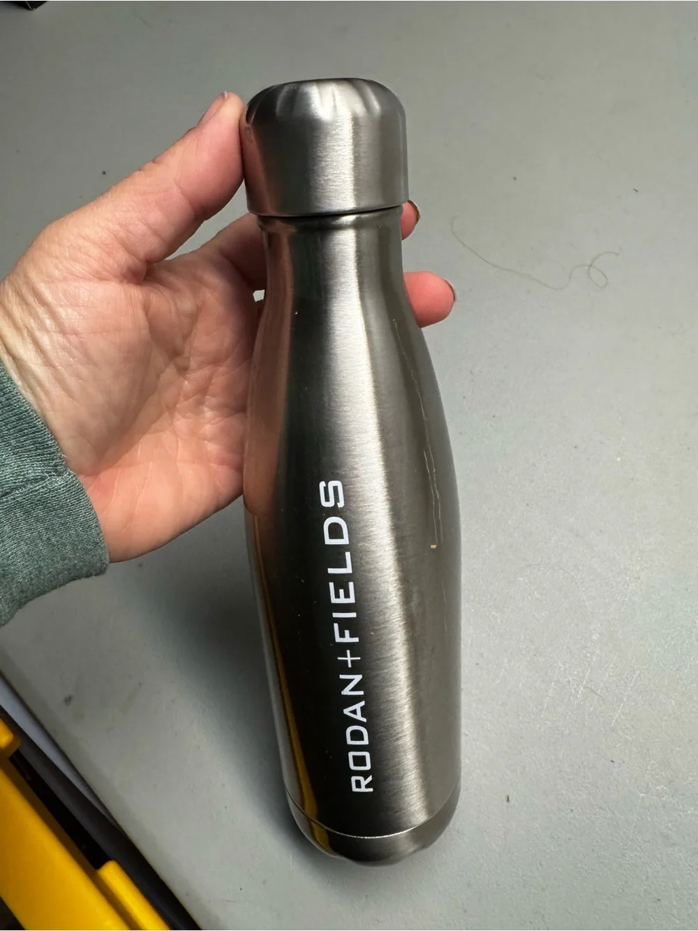 Rodan + Fields Metallic Silver Insulated Bottle with White Logo